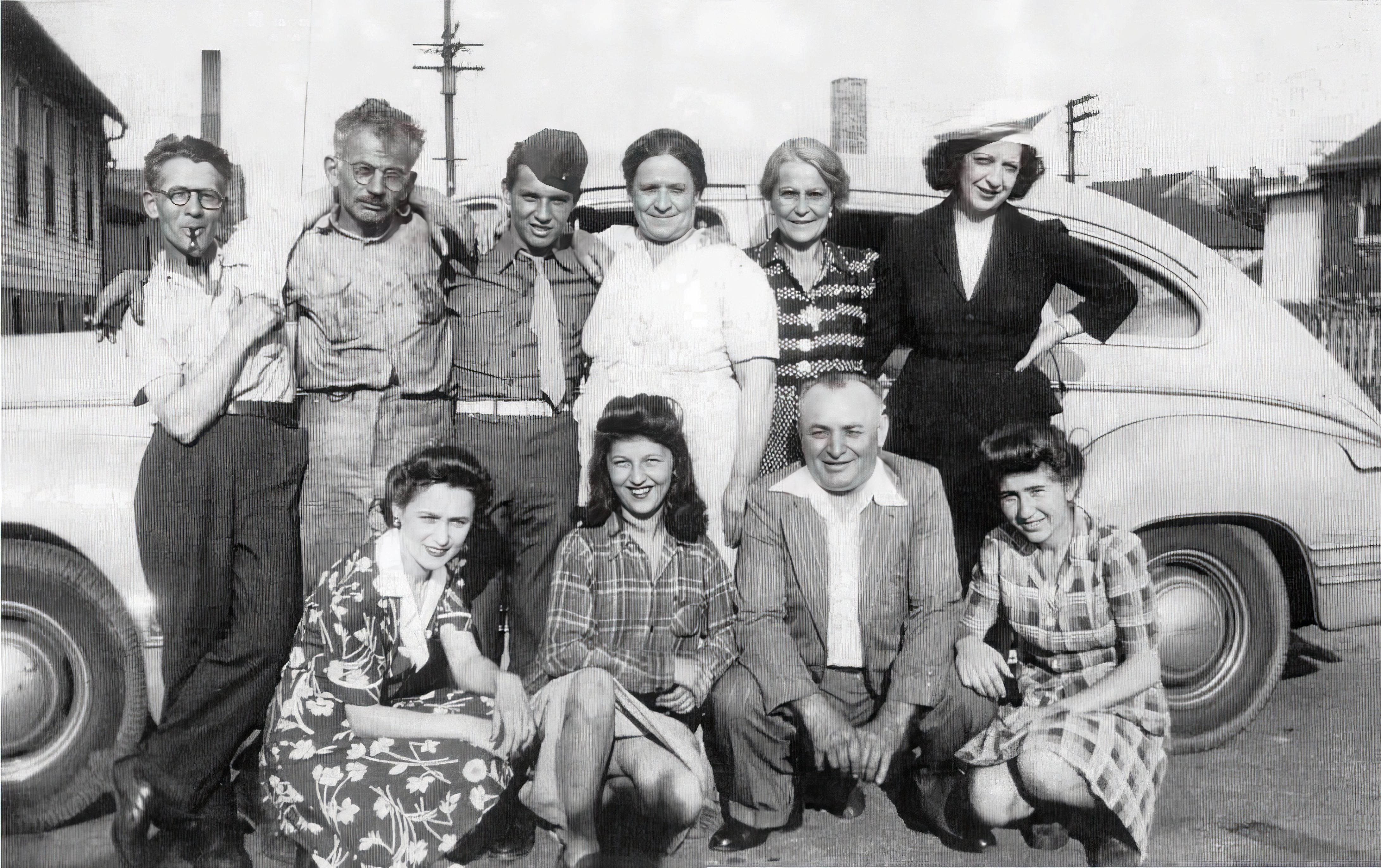 group of people in front of car, 1943